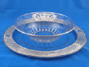 Appraisal: A large glass plate the broad rim with marked silver