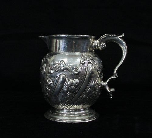 Appraisal: A silver jug converted from a tankard cancelled Georgian marks