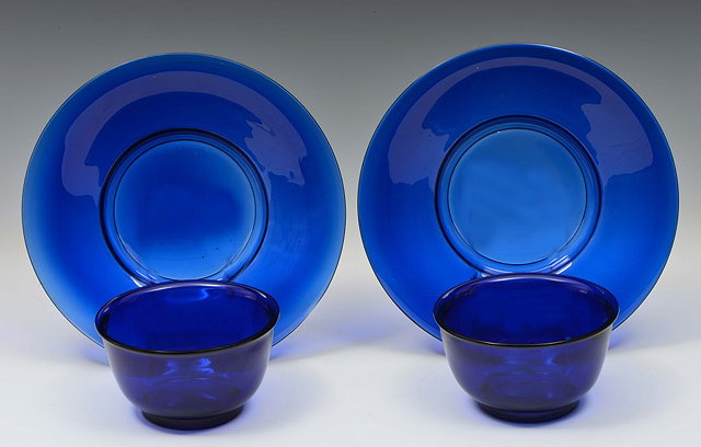 Appraisal: A PAIR OF PEKING BLUE GLASS BOWLS and stands cm