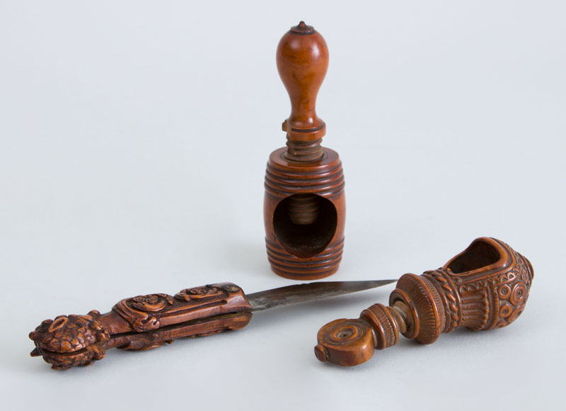 Appraisal: THREE CONTINENTAL CARVED WOOD ARTICLES Comprising a balloon-shape nutcracker and