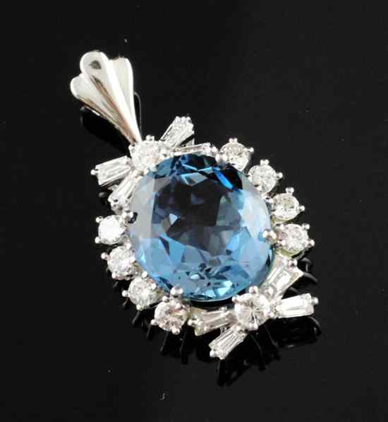 Appraisal: An ct white gold blue topaz and brilliant and baguette