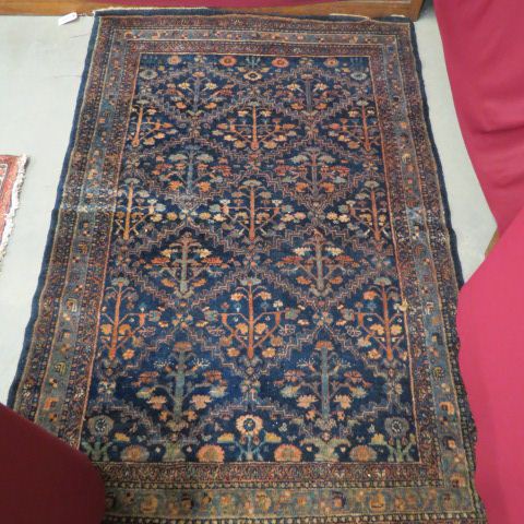 Appraisal: Antique Persian Handmade Rug stylized florals on blue field '