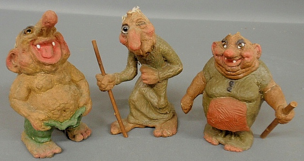 Appraisal: - Three composition troll figures with glass eyes probably late