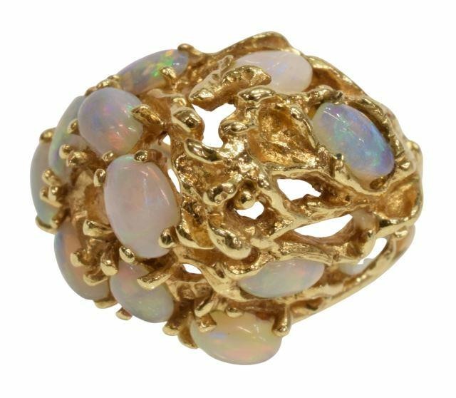 Appraisal: Estate kt yellow gold ring set with twelve opal cabochons