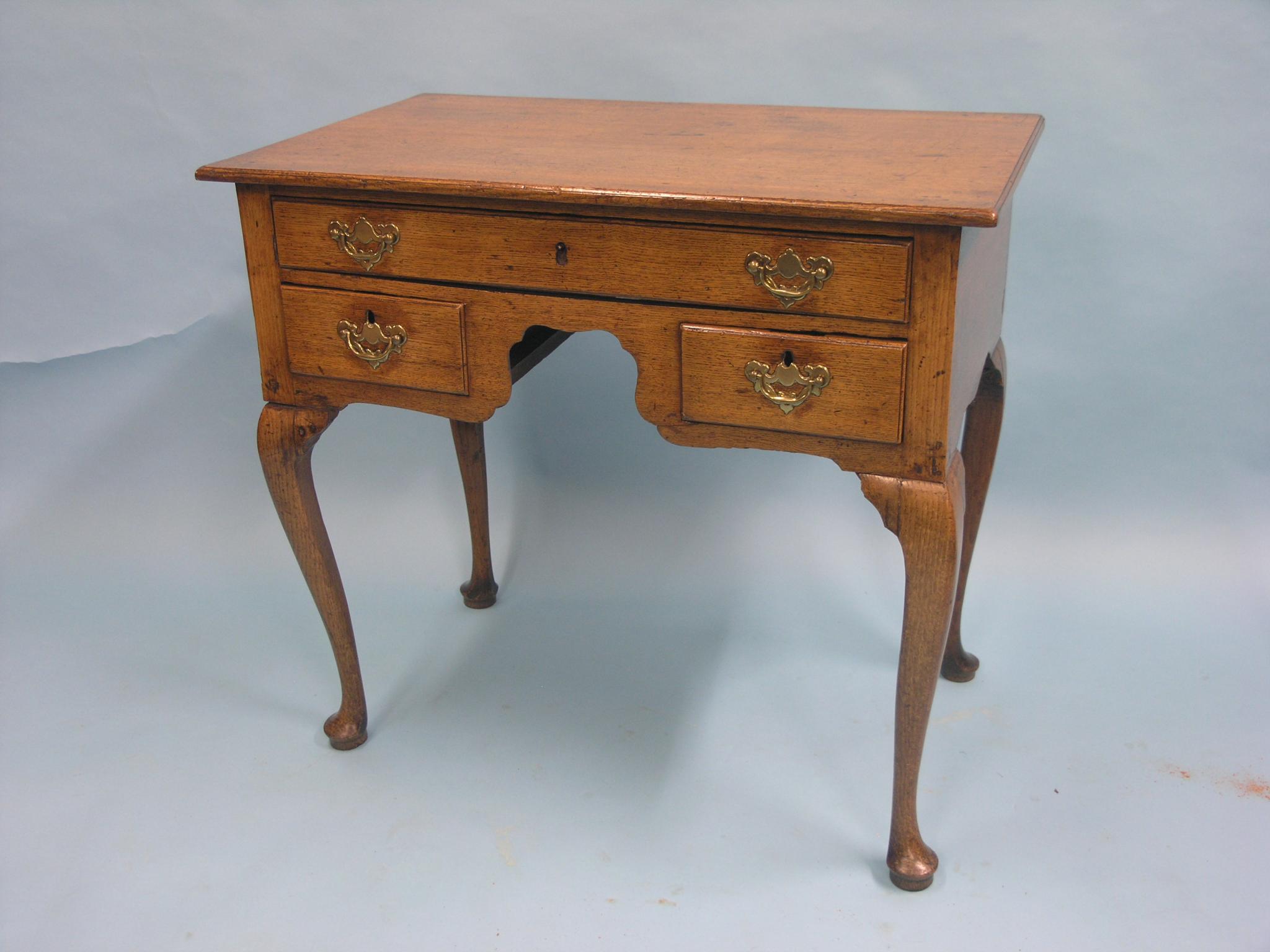 Appraisal: A mid- th century provincial oak kneehole writing desk one