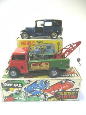 Appraisal: Two Minic clockwork toys comprising London Taxi blue and black