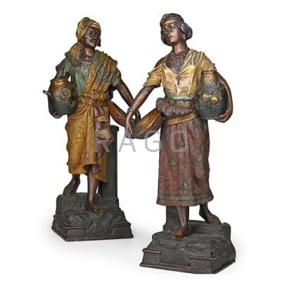 Appraisal: PAIR OF TERRA COTTA WATER CARRIERS Male and female with