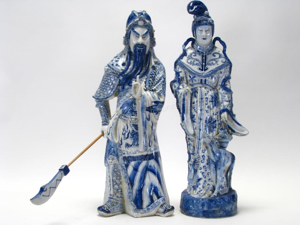 Appraisal: Two Monumental Oriental Porcelain Figures blue and white figures depicting