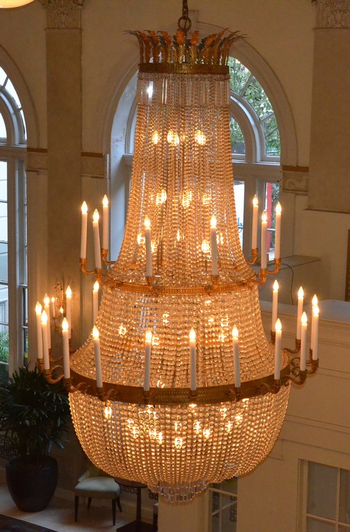 Appraisal: Crystal and gilt bronze tier chandelier containing lights removed from