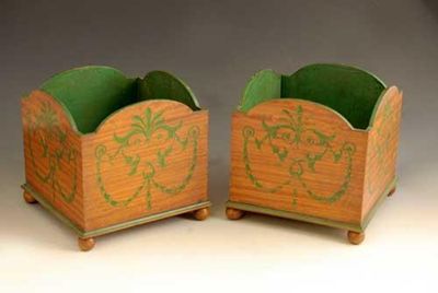 Appraisal: A pair of satinwood jardinieres each painted with scrolls of