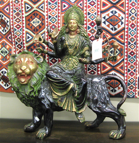 Appraisal: EAST INDIAN BRONZE SCULPTURE the goddess Durga depicted as having