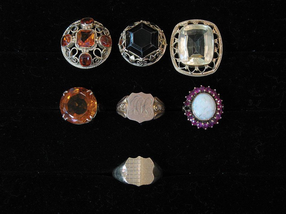 Appraisal: AN OPAL AND RUBY DRESS RING the central oval cabochon