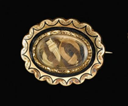 Appraisal: Two tone gold memorial brooch victorian Accented by black mourning