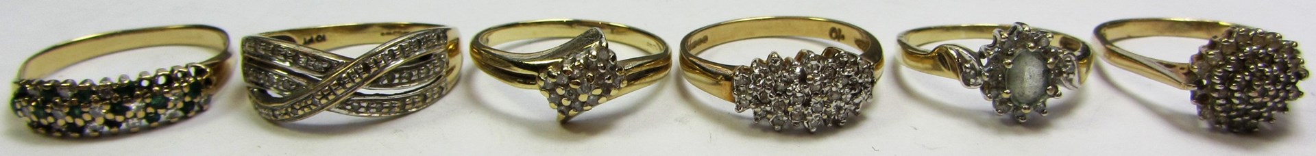 Appraisal: Four ct gold and diamond set rings in a variety