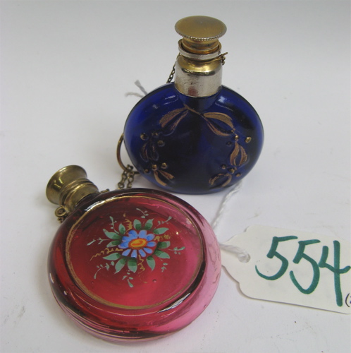 Appraisal: TWO VICTORIAN GLASS SCENT BOTTLES One an enameled cranberry glass