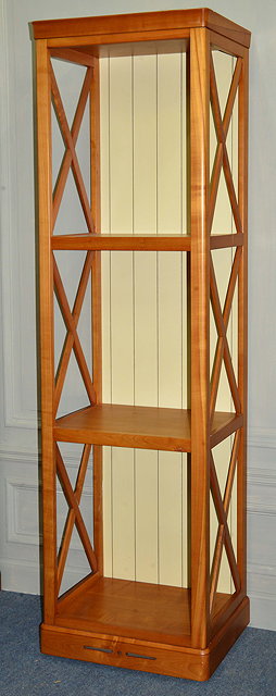 Appraisal: A MAPLE WOOD BOOKCASE with five shelves 'X' supports to