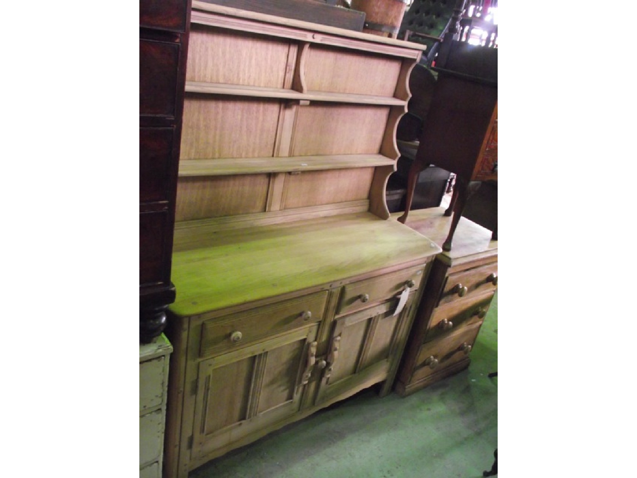 Appraisal: Stripped Ercol dresser enclosed by two panelled doors and two