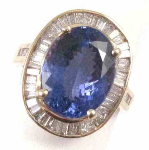 Appraisal: TANZANITE DIAMOND AND YELLOW GOLD RING The k gold ring