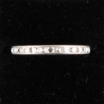 Appraisal: A diamond full circle eternity ring Set with calibre cut