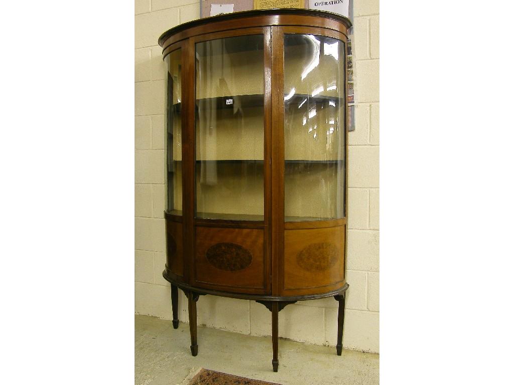 Appraisal: Edwardian mahogany inlaid demi-lune display cabinet the moulded top over