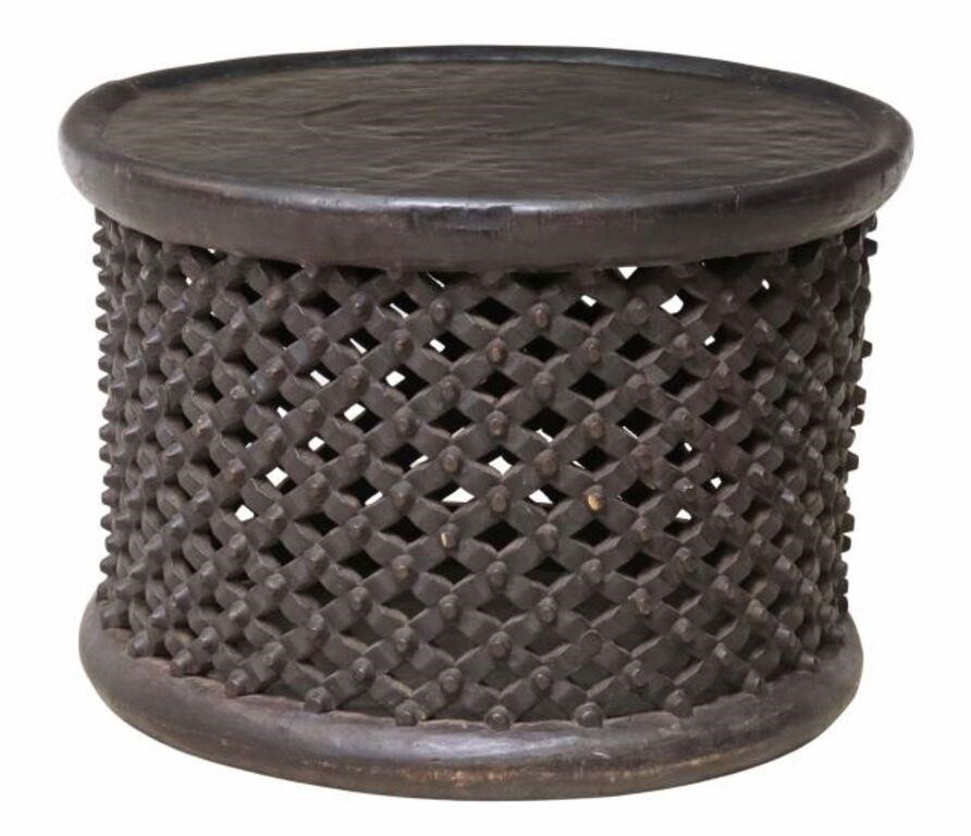 Appraisal: African ebonized tray coffee table Andrianna Shamaris Incorporated round top