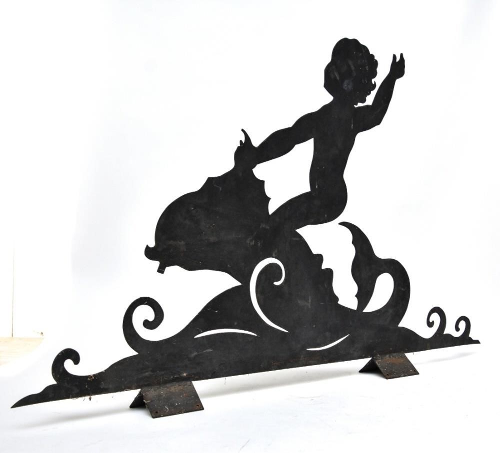 Appraisal: Sheet metal sculpture of a boy riding a sea creature