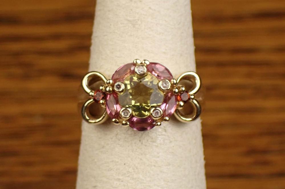 Appraisal: LEMON QUARTZ TOURMALINE AND FOURTEEN KARAT GOLD RING The k