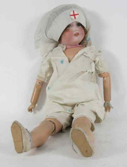 Appraisal: An Armand Marseille bisque head doll with brown weighted eyes