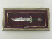 Appraisal: A large Pakistani presentation knife with parcel-gilt silvered mounts and