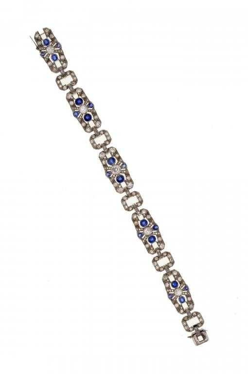 Appraisal: A SAPPHIRE AND DIAMOND BRACELET of five geometric panels with