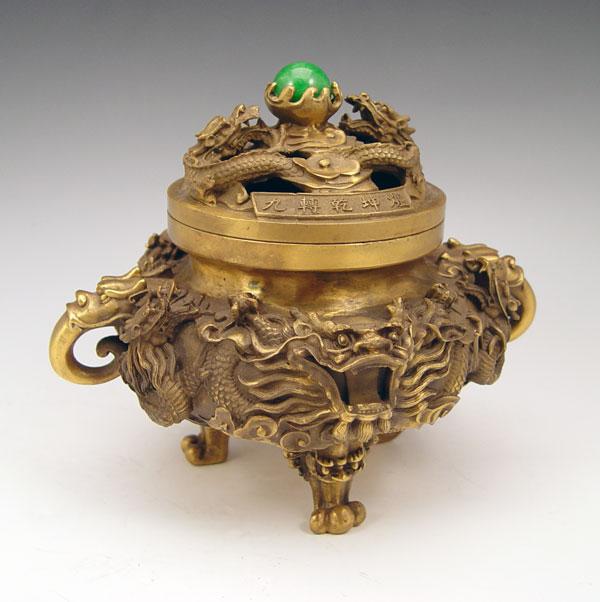 Appraisal: DRAGON CHINESE BRASS CENSOR With a green hardstone ''pearl'' Ca