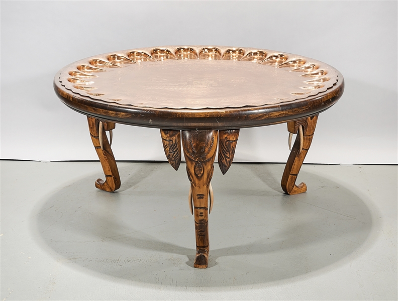 Appraisal: Embossed copper top wood table top central design depicting a