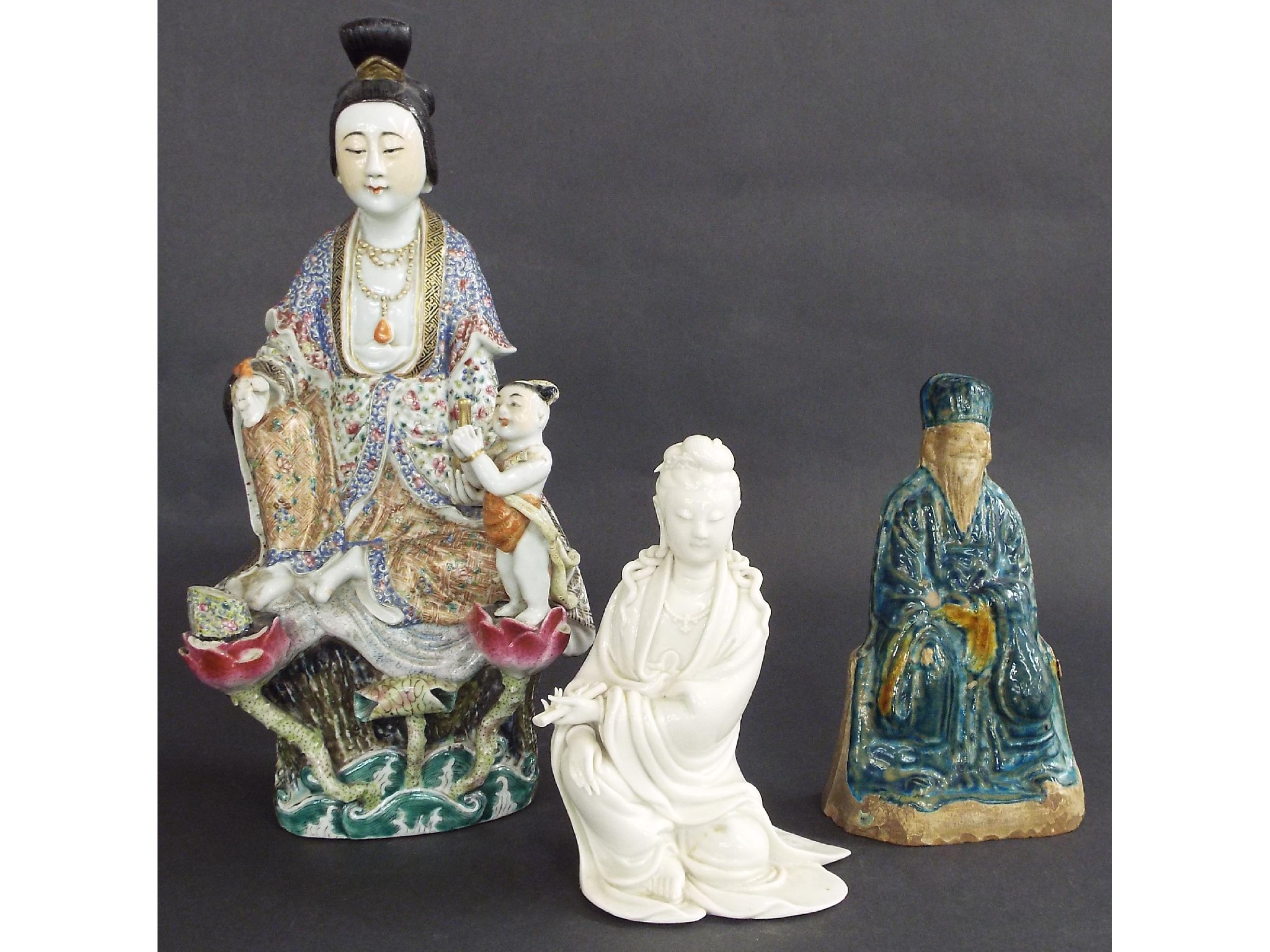 Appraisal: Chinese porcelain famille rose character group modelled as a seated