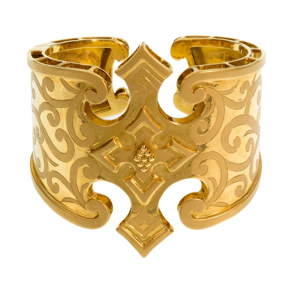 Appraisal: PAULA CREVOSHAY K YELLOW GOLD CUFF BRACELETOpen back hinged having