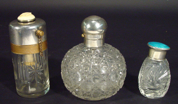 Appraisal: Globular cut glass silver topped scent bottle one other with