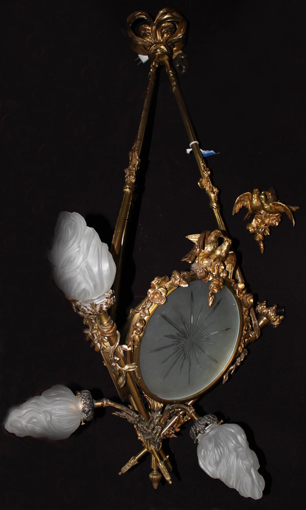 Appraisal: LOUIS XVI STYLE ORMOLU SEVEN-LIGHT CHANDELIER with three circular etched