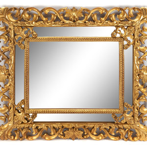 Appraisal: An Italian Rococo Style Giltwood Mirror th Century Height x