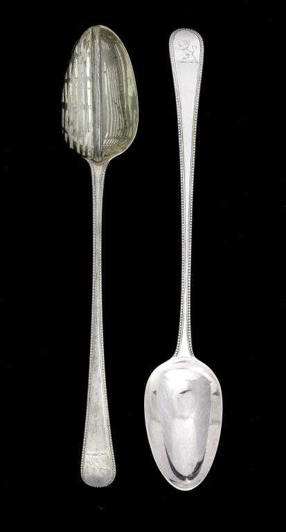 Appraisal: A PAIR OF GEORGE III STRAINING AND GRAVY SPOONS Beaded