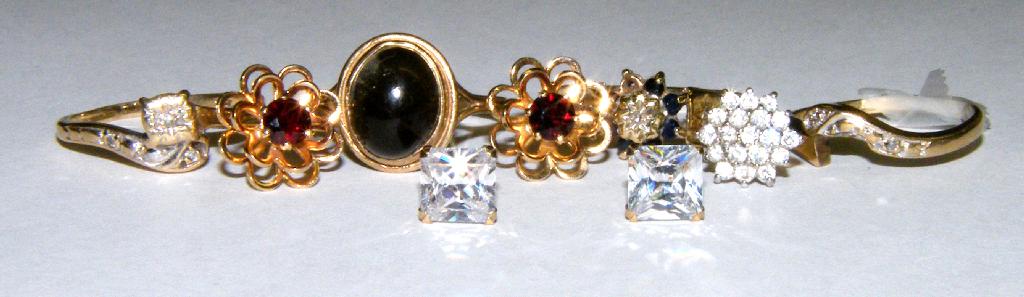 Appraisal: Four ct stone set rings two pairs of ct earrings