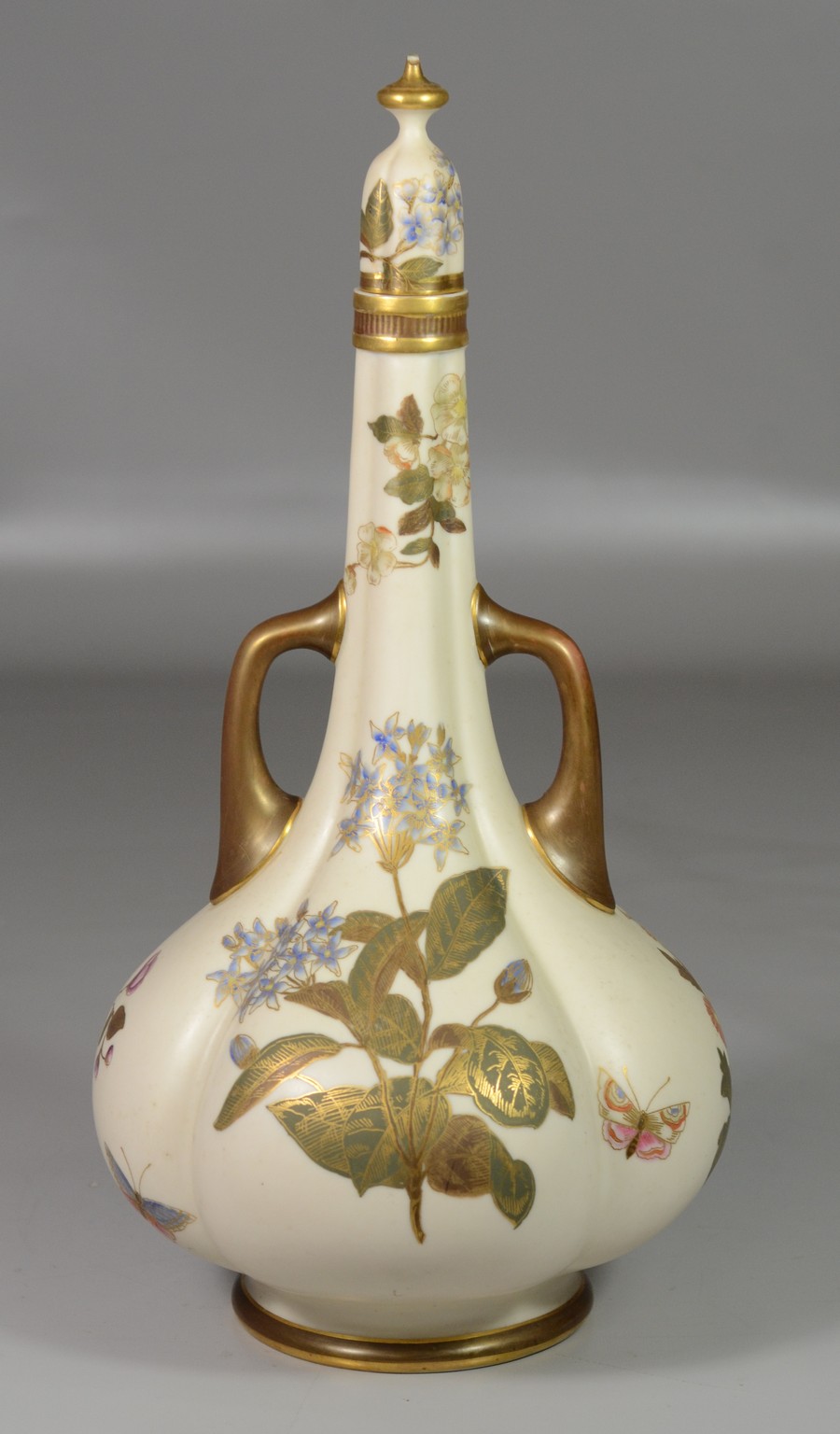 Appraisal: Royal Worcester floral gilt decorated covered urn with lid chip