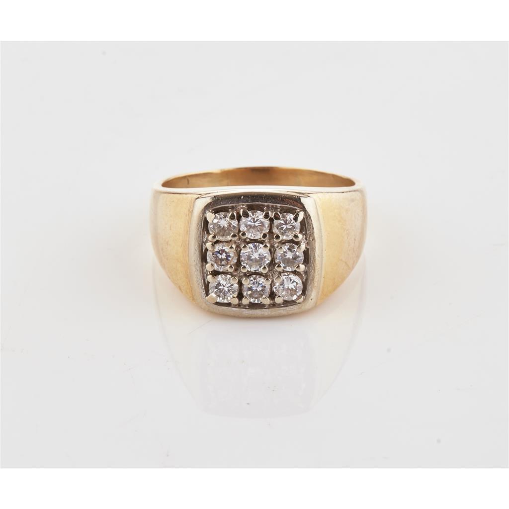 Appraisal: A gentleman's diamond set ring the square cluster set with