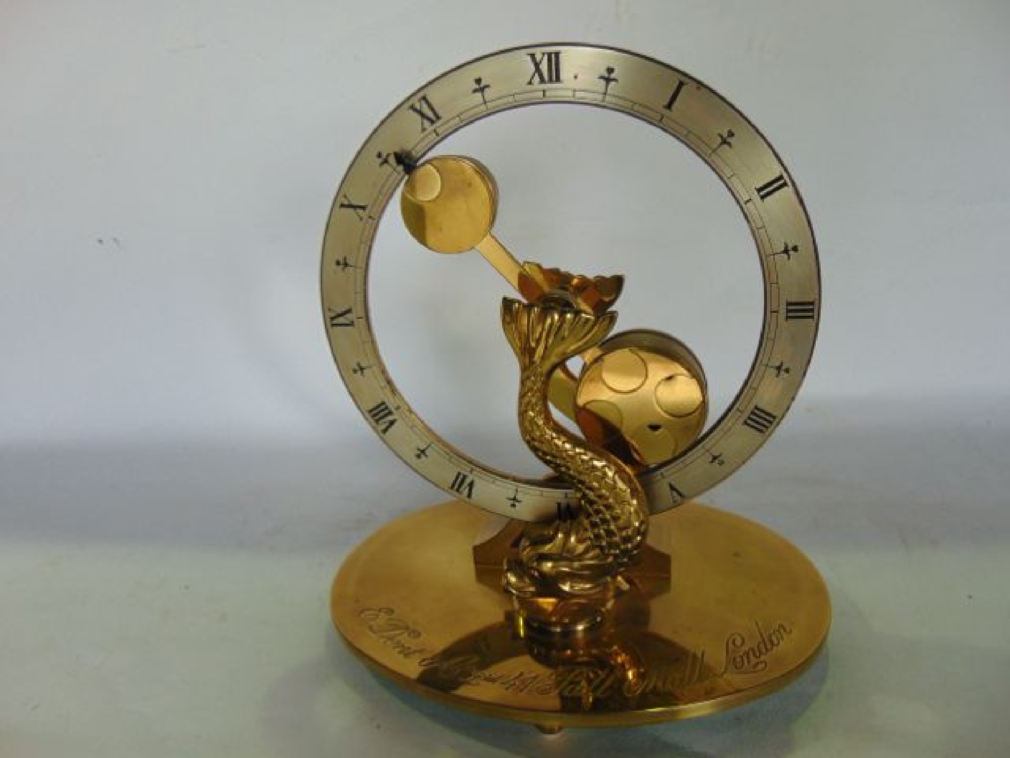 Appraisal: A contemporary mystery clock by E Dent Co Ltd Pall