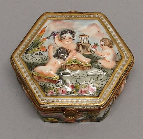 Appraisal: Hexagonal form putti with bird and cage w S