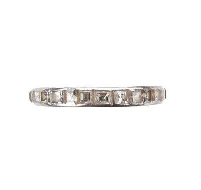 Appraisal: A diamond full circle eternity ring Set with baguette shaped