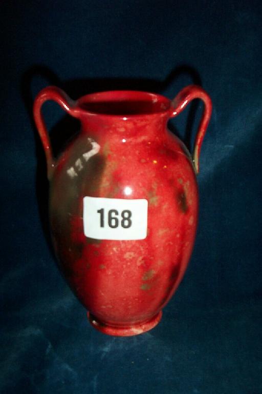 Appraisal: A Royal Doulton Flambe -handled vase with painted initials to