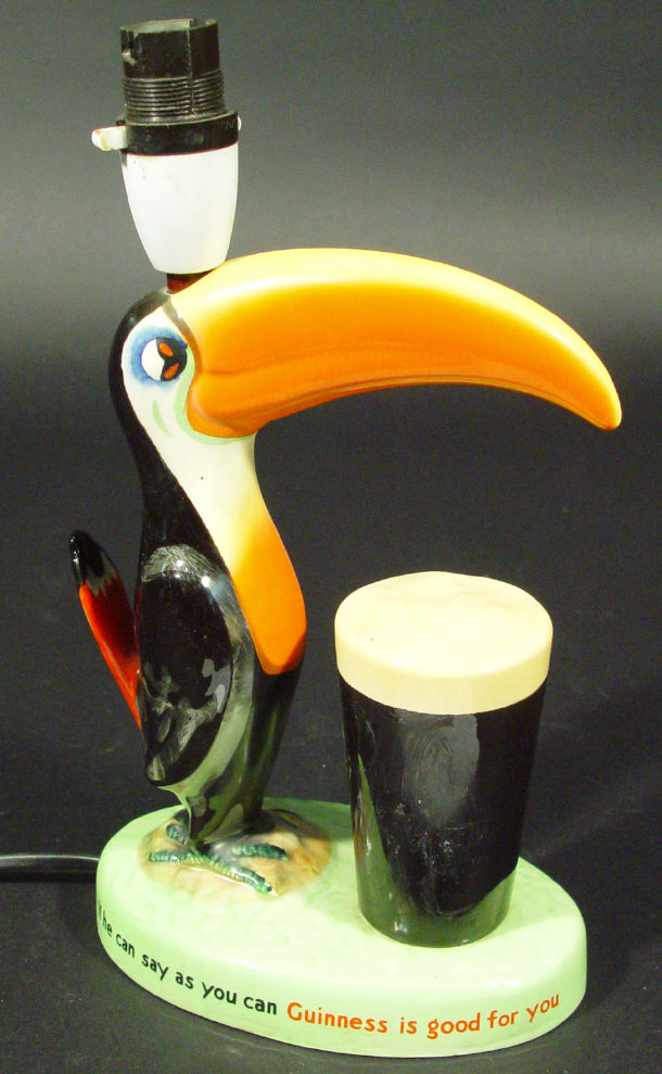 Appraisal: Carltonware Guiness advertising Toucan table lamp with hand painted decoration