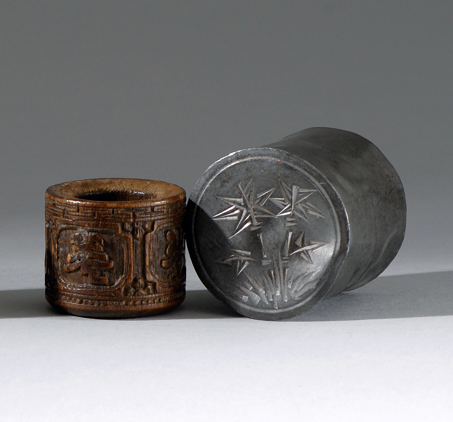 Appraisal: PEWTER-CASED COCONUT SCHOLAR'S RING Early th CenturyRing in cylinder form