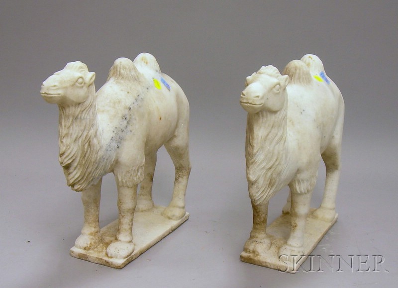 Appraisal: Pair of White Hardstone Camels ht in