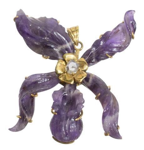 Appraisal: Large estate carved amethyst floriform pendant centered by rose cut