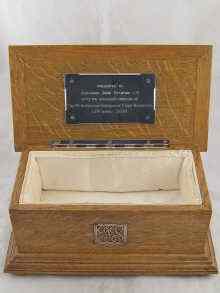 Appraisal: A satin lined oak freedom casket x x cm high